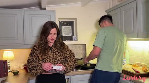 Lily prepares food in leopard print top while Joe cooks in kitchen, Lustery amateur couple video