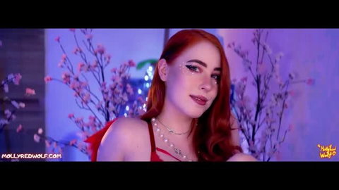 Mollyredwolf in red lingerie with pearl necklace and face gems