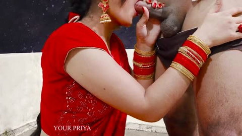 Your Priya in red sari giving interracial blowjob with tongue out