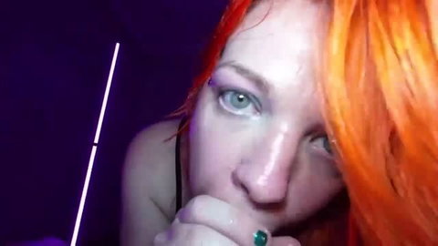 Redhead lactating slut with green nails, up close face shot