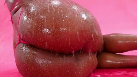 Tessa Thomas oiled ass in pink micro thong