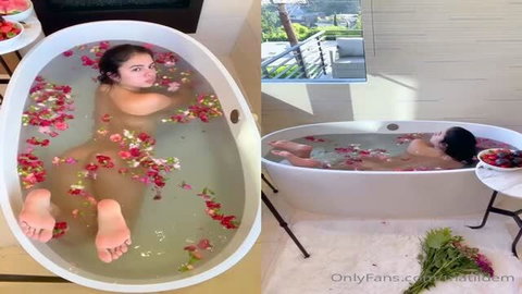 Mati Marroni completely nude in bathtub surrounded by rose petals