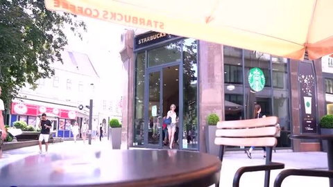 Julie Holly & Candy Teen in Starbucks outdoor cafe seduction scene thumbnail