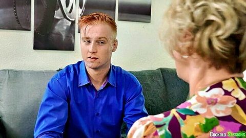 Dee Williams in cuckold session, blonde MILF in floral dress with redhead man