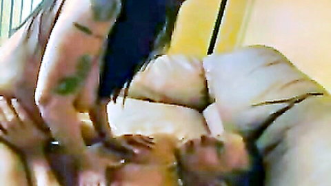 Tattooed mature woman giving intense handjob close-up