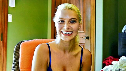 Anikka Albrite blonde smiling in blue top, teasing adult thumbnail