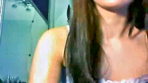 Slim Asian teen in white tank top, webcam bathroom tease