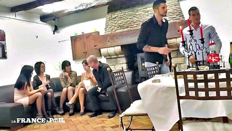 Sexy group at wild swinger party with women in short dresses and men mingling