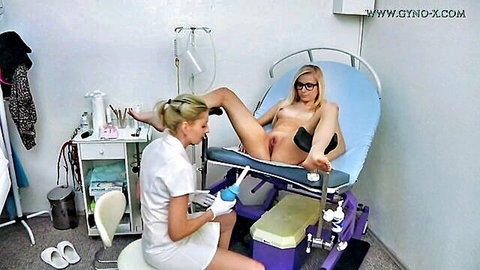 Blonde patient spread wide in gyno exam by nurse