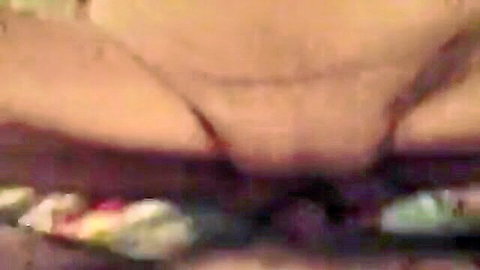 Close-up of mature woman's wet pussy during penetration in amateur granny sex video