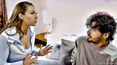 Bella Rolland in low-cut white top talking to curly-haired man, cheating scene