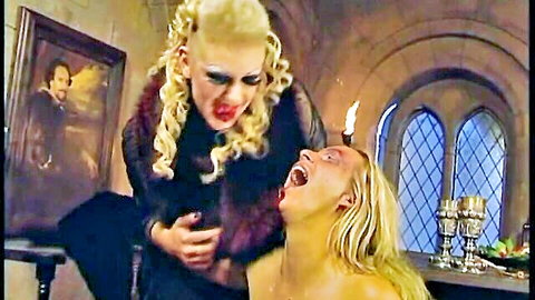 Daria Glower dominantly bites blonde model's neck in erotic lesbian scene