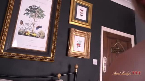Sadie MILF with natural tits in bedroom scene