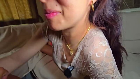 Passionsecret07 in sheer lace top with gold jewelry, close-up from adult video