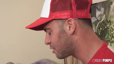 Cherie DeVille in red and white trucker cap from The Lady And The Pizza Boy