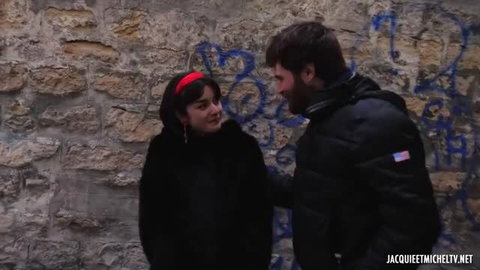 Crystal, 22-year-old student in Bordeaux, wearing red headband and black coat