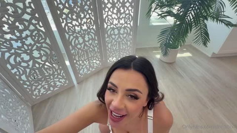 Martina Smeraldi smiling in white lingerie on OnlyFans