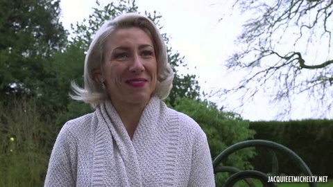 Julie in white knit sweater, close-up outdoor portrait