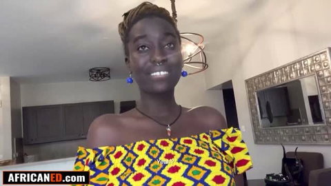 Crystal thick married ebony in colorful off-shoulder top, smiling