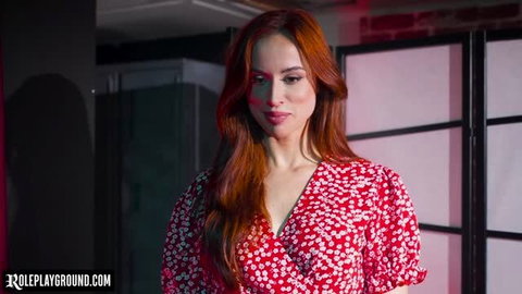 Redhead Audrey Reid in floral wrap dress, seductive pose