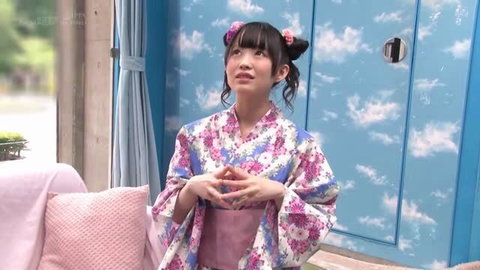 Japanese woman in floral yukata with pink hair accessories