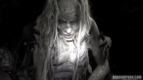 Horror porn zombie woman with pale skin and long hair