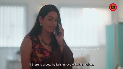 Indian woman in floral dress talking on phone, softcore scene