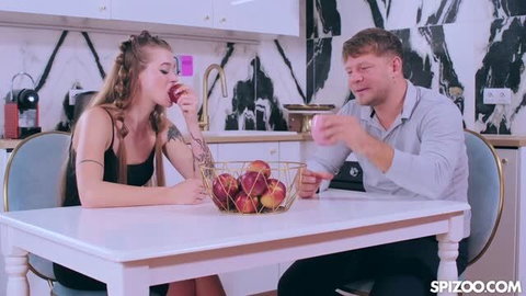 Olivia Sparkle eating apple while horny roommate watches at kitchen table