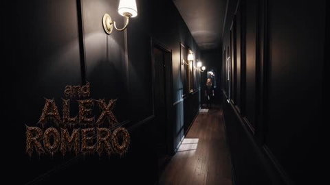 Emma Rosie in dark hallway with Alex Romero in Parasited Alien Infection