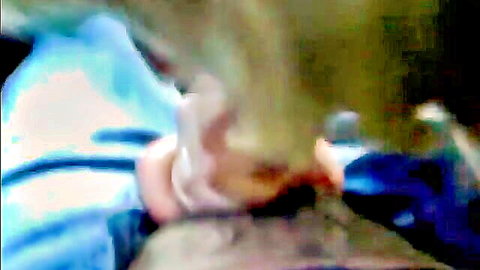 Luda giving intense blowjob in car, close-up oral action