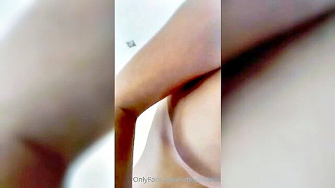 Alexandra Cat sexy bimbo teasing nude breast on OnlyFans