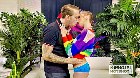 Breezy Bri in steamy hookup kiss, embracing partner in colorful sweater and panties
