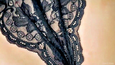 Honey Haze in seductive black lace lingerie close-up tease