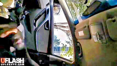 Amateur military-clad flashing in driving car POV view