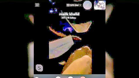 Blurry Snapchat screenshot of nude Arab woman exposing tits in glossy yellow filter
