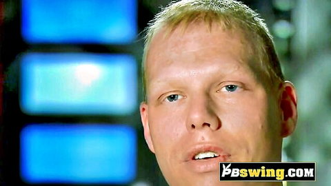Closeup portrait of blonde swinger guy with open mouth in studio from vbswing.com