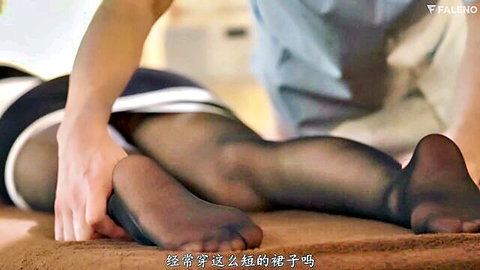 Yuko Ono in black stockings receiving lewd leg massage in JAV