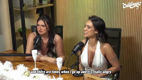Brunette in white dress discusses sex goals on California TV podcast
