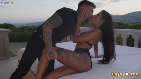 Sarah Lollypop passionate outdoor sex with tattooed man on balcony bed