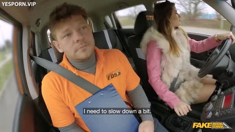 Gia Tvoricceli driving in pink top and fur vest with Michael Fly in car