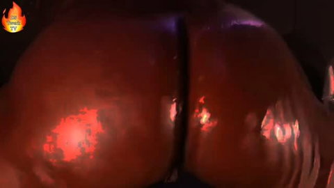 Oiled red skin twerking ass closeup with shiny highlights