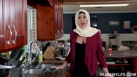 Abby Somers in hijab and maroon blazer for MILF porn scene