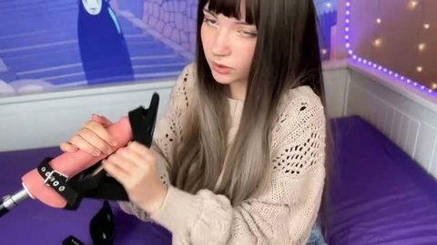 Cute girl in sweater giving CBT and heel fetish play