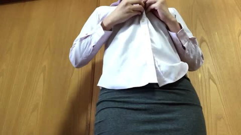 Japanese amateur woman unbuttoning white office shirt and dark skirt