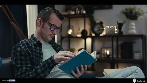 Man reading book in glasses and plaid shirt, freeze fetish