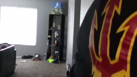 Jock in athletic hoodie, bare ass visible in living room