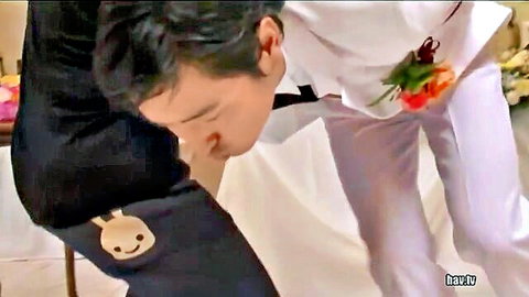 Yui Tatsumi in wedding gangbang JAV scene, groom bending in suit
