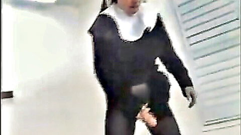 Kat in dominant nun outfit giving handjob, Female Authority scene