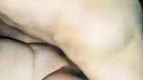 Close-up of woman's ecstatic facial expression in intimate moment