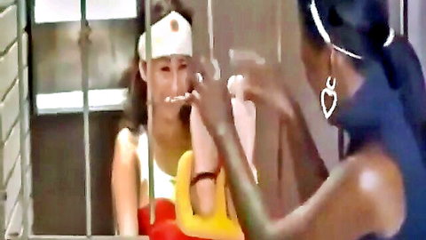 Wonder Woman cosplay tickled by black woman in cage